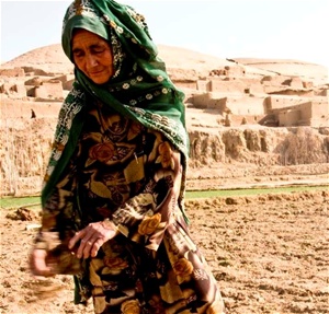 Farmer, field and village, Jawzjan, Afghanistan