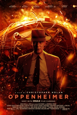 Cillian Murphy as J. Robert Oppenheimer stands in front of the ignited "Gadget" nuclear bomb.