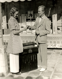 Earle-Strebe-sells-1st-ticket-at-Plaza-Theatre-to-Annette-1936