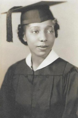 Black and white photograph of Gladys Wood in a graduation cap and gown