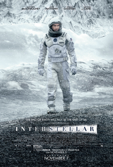 An astronaut on a cold mountain setting with snow falling with another mountain as a ceiling: Four of the actors' names appear on the top, with a headline reading "The End of Earth Will not be the End of Us." Above the film's title, the text reads "A film by Christopher Nolan", and credits are printed on the bottom.