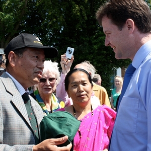 Nick Clegg being presented a Gurkha Hat, by a Gurkha veteran