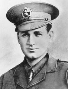 Formal head-and-shoulders portrait of a man in military uniform and cap.