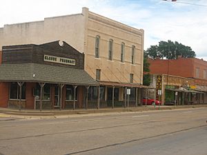 A view of downtown Claude, Texas, on U.S. Highway 287 with the historic pharmacy building on the left