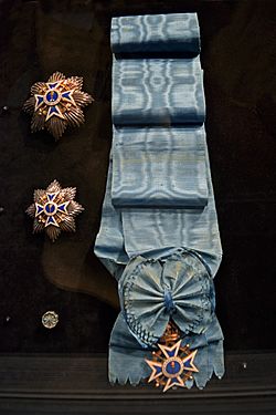 Royal Order of Kalākaua badge and sash.jpg
