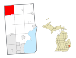 Location within Macomb County (red) and an administered portion of the Romeo village (pink)