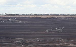 Loy Yang open cut brown coal mine and dredgers