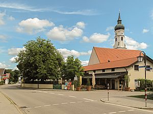 Siegertsbrunn, church tower in the street