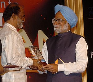 The Prime Minister, Dr. Manmohan Singh presented the Entertainer of the Year Award to Shri Rajnikanth, at the 'NDTV Indian of the Year Awards Function', in New Delhi on January 17, 2008