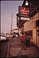 STREET SCENE ON 47TH STREET IN SOUTH SIDE CHICAGO, A BUSY AREA WHERE MANY SMALL BLACK BUSINESSES ARE LOCATED. MANY OF... - NARA - 556222