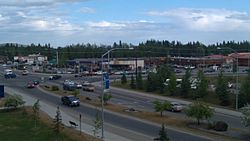 The intersection of Alumni Drive/College Road with Farmers Loop Road/University Avenue is the historic and commercial center of the College community.  Photo taken June 2011 from the side of Troth Yeddha' (College Hill), upon which the University of Alaska Fairbanks campus sits.