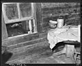 Detail of kitchen in home of Eddie Cain, Negro miner, who lives in company housing project. Adams, Rowe & Norman... - NARA - 540594