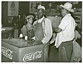 Mexican and negro cotton pickers inside plantation store, Knowlton Plantation, Perthshire, Miss. Delta. This transient labor is contracted for and brought in trucks from Texas each season. October 1939