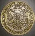 A coin of the Seal of the Order of Canada