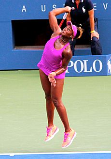Sloane Stephens serves at the US Open (9662688451) (cropped)