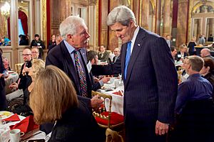 Secretary Kerry Greets Environmental Activist Ted Turner Before Addressing a UN Foundation-Hosted Breakfast Meeting Focused on the Ocean in Paris (22977278124)