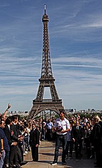 Zlatan Ibrahimovic greeting PSG fans with the Eiffel Tower in the background