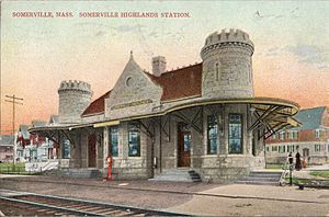 A postcard of a castle-like railway station