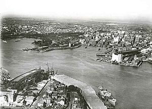 Aerial view of Sydney Harbour - the bridge is under construction