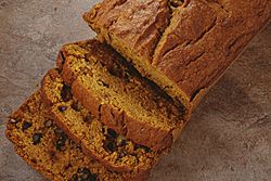 A delicious loaf of homemade pumpkin walnut bread.