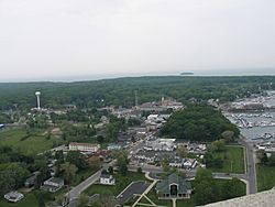 View from atop the observation deck of the Perry Memorial, looking down into the village's downtown area and DeRivera Park (wooded area to the right)