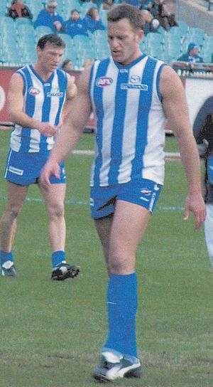 Sav Rocca playing for North Melbourne (2004)