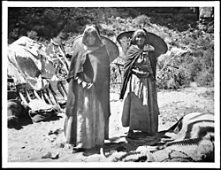 Two Havasupai Indian women with "Kathaks" on their backs, ca.1900 (CHS-3373)