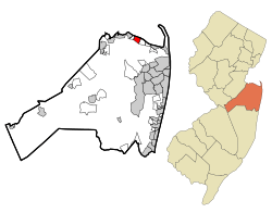 Map of Port Monmouth, highlighted in Monmouth County. Right: Location of Monmouth County in New Jersey.