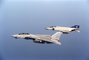 F-14A Tomcat of VF-32 in flight with Phantom FGR.2 of 19 Squadron RAF on 21 December 1990