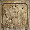 Votive relief with Apollo, Leto and Artemis (5th cent. B.C.) at the National Archaeological Museum of Athens on 4 July 2018