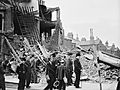 Winston Churchill visiting bomb-damaged areas of the East End of London, 8 September 1940. H3978