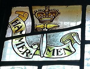Stirling, 8-10 Corn Exchange Road - Incorporated Trades stained glass panel Hammermen