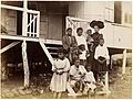 Women in front of a school in Lolowai by John Watt Beattie 1906