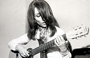 Fairuz playing the guitar