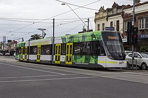 E 6001 (Melbourne tram) in Nicholson St on route 96, 2013
