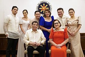 President Rodrigo Roa Duterte poses for a photo with the first family after delivering his 3rd SONA