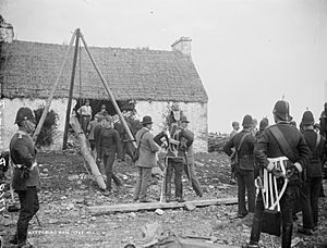 T.Birmingham's house, Moyasta, Co.Clare with Battering Ram and soldiers outside (23690403360)
