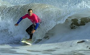 US Navy 081025-N-1722M-449 Jefferey Easson rides a wave off of Point Mugu during the first Naval Base Ventura County Surf Contest