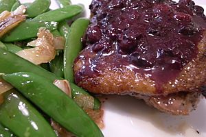 Duck Roast with Blueberry Sauce, Side of Snap Peas