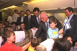 Flickr - Government Press Office (GPO) - P.M. Rabin with Russian Immigrants