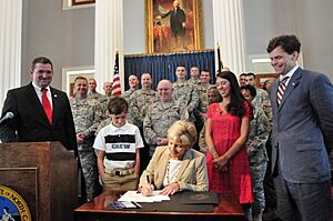 Governor Bev Perdue signing military bills into law