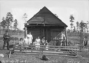 Group of Nine Near Wood Frame Building 1909
