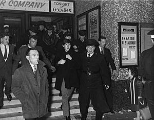 The Beatles emerging from the Ritz Cinema, Fisherwick Place, Belfast November 8, 1963