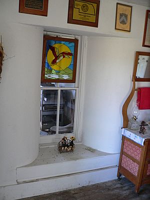 Dowse sod house interior kitchen S window