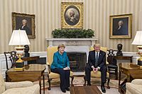 photograph of Merkel and Trump