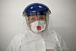 Mask Nurse Donna Wood in her safety suit