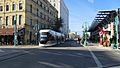 Hop streetcar eastbound on St Paul Ave at Broadway, Nov 2018