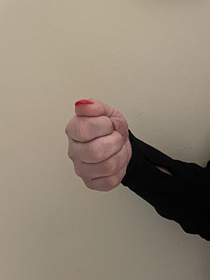 All fingers are closed and possibly only the thumb is selected