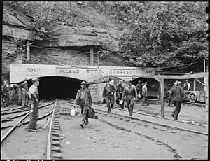 Changing shifts at the mine portal in the afternoon. Inland Steel Company, Wheelwright ^1 & 2 Mines, Wheelwright... - NARA - 541450