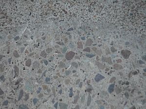 Concrete aggregate grinding